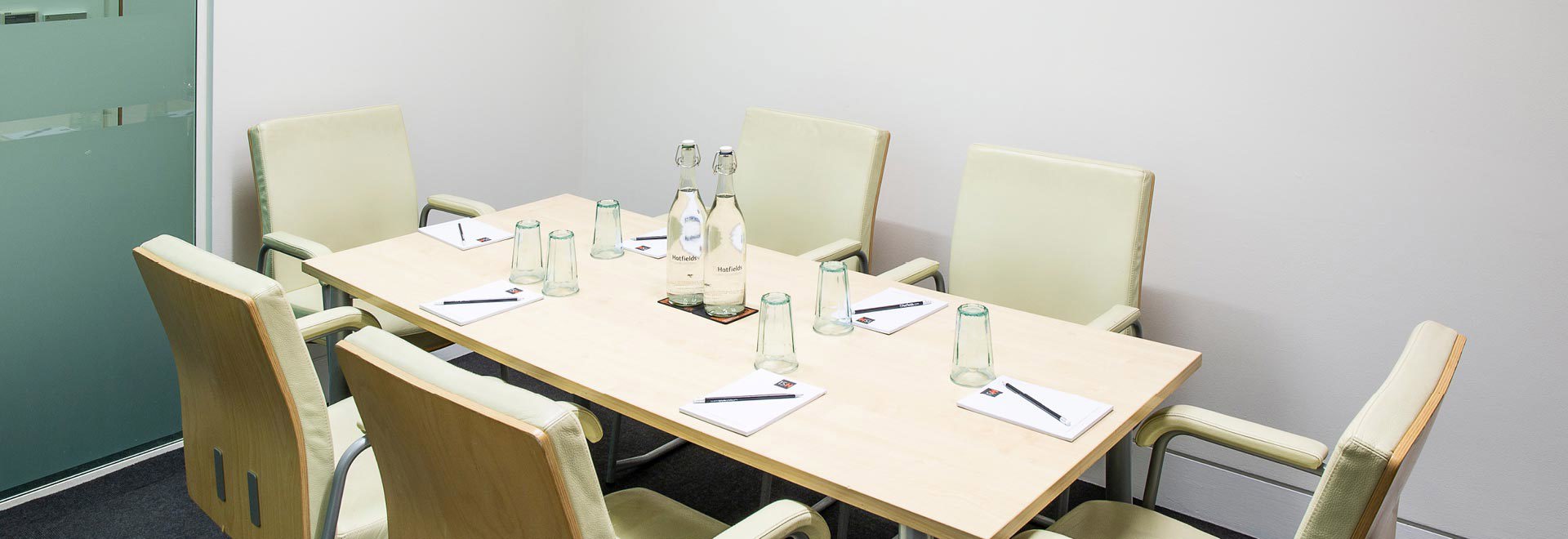 Tidal room with table and chairs